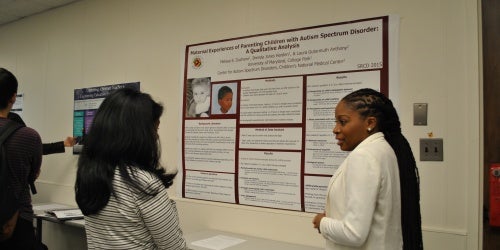 COE Doctoral student presenting research poster