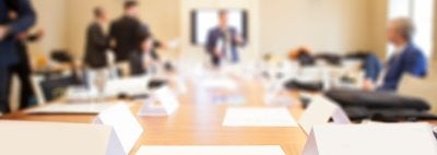 conference table with papers on the table