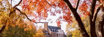UMD building with fall leaves around it