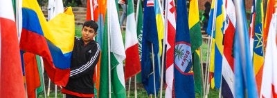Child holds flag at Maryland Day