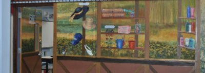 A mural of a beach shop at the Harbour School's Friday market.