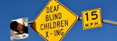 Caution deaf blind student crossing sign