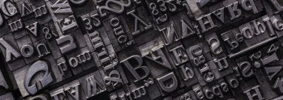 an assortment of letters on a printing press