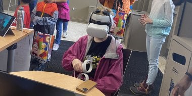 Visitors played with VR headsets and controllers in the College of Education at Maryland Day 2023.
