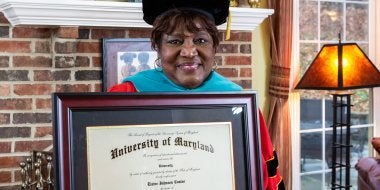 Elaine Johnson Coates '59 holds her honorary doctorate