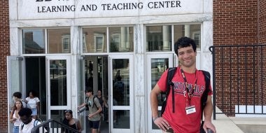 TerpsEXCEED Student outside of Edward St. John's Teaching Center