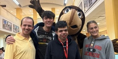 TerpsEXCEED students, staff, and mentors at STAMP with Testudo Mascot