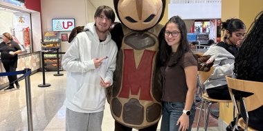 TerpsEXCEED Student and Peer Mentor with Testudo Mascot