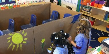 Children Building Cardboard Bus