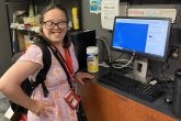 TerpsEXCEED Student at computer in UMD Bookstore
