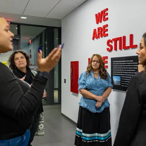 From left: Piscataway-Conoy tribal members Tiara Thomas, Anjela Barnes '04 and Zelda Proctor discuss the new Honors College course about Indigenous Maryland with Assistant Clinical Professor Angela Stoltz (right).