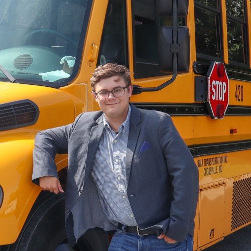 Tyler Fineman ’25, school bus driver and history teacher in training. Photo by Tatiana Herrera