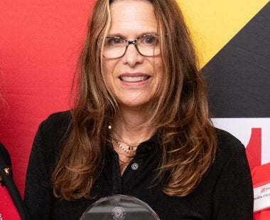 Woman receiving an award 