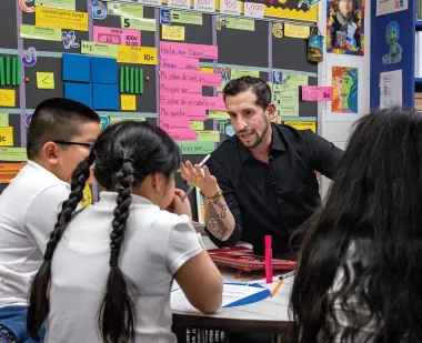 A teacher leads a literacy activity at Cool Spring Elementary, a local dual-language elementary school, which works with the Maryland Initiative for Literacy and Equity.