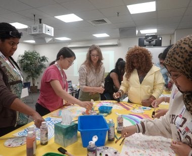 High school students work on an art project as part of the ExploreEd program