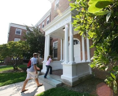 Benjamin Building with students walking in the entrance
