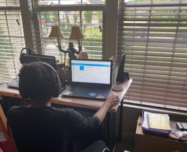 CPA student working at home at desk