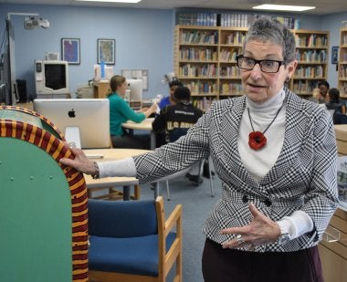 COE Alumna Dr. Linda Jacobs in the Harbour School library.