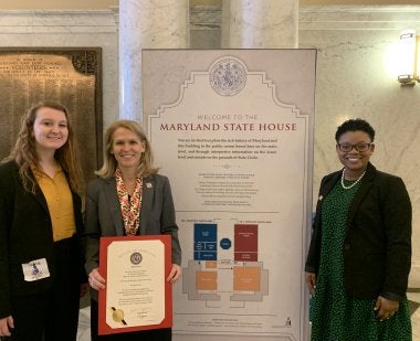 Dean Rice and two students at MD Senate