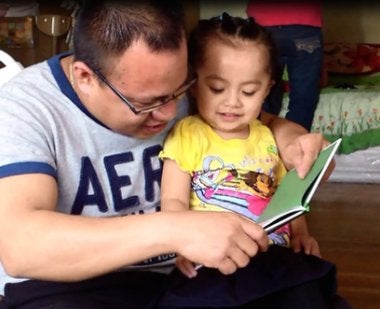Reading book to toddler