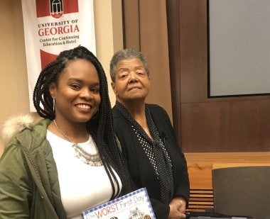 UMD doctoral student Autumn Griffin with Elizabeth Eckford, one of the members of the Little Rock Nine, who was a speaker at the conference.