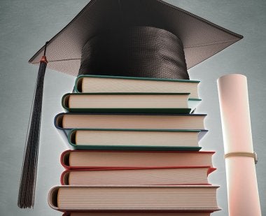 Graduation cap on top of dissertations