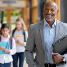 Male Principal Smiling