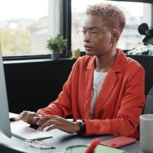 Female Administrator Looking at Computer