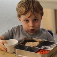 child eating trash free lunch