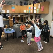 Classroom practicing yoga