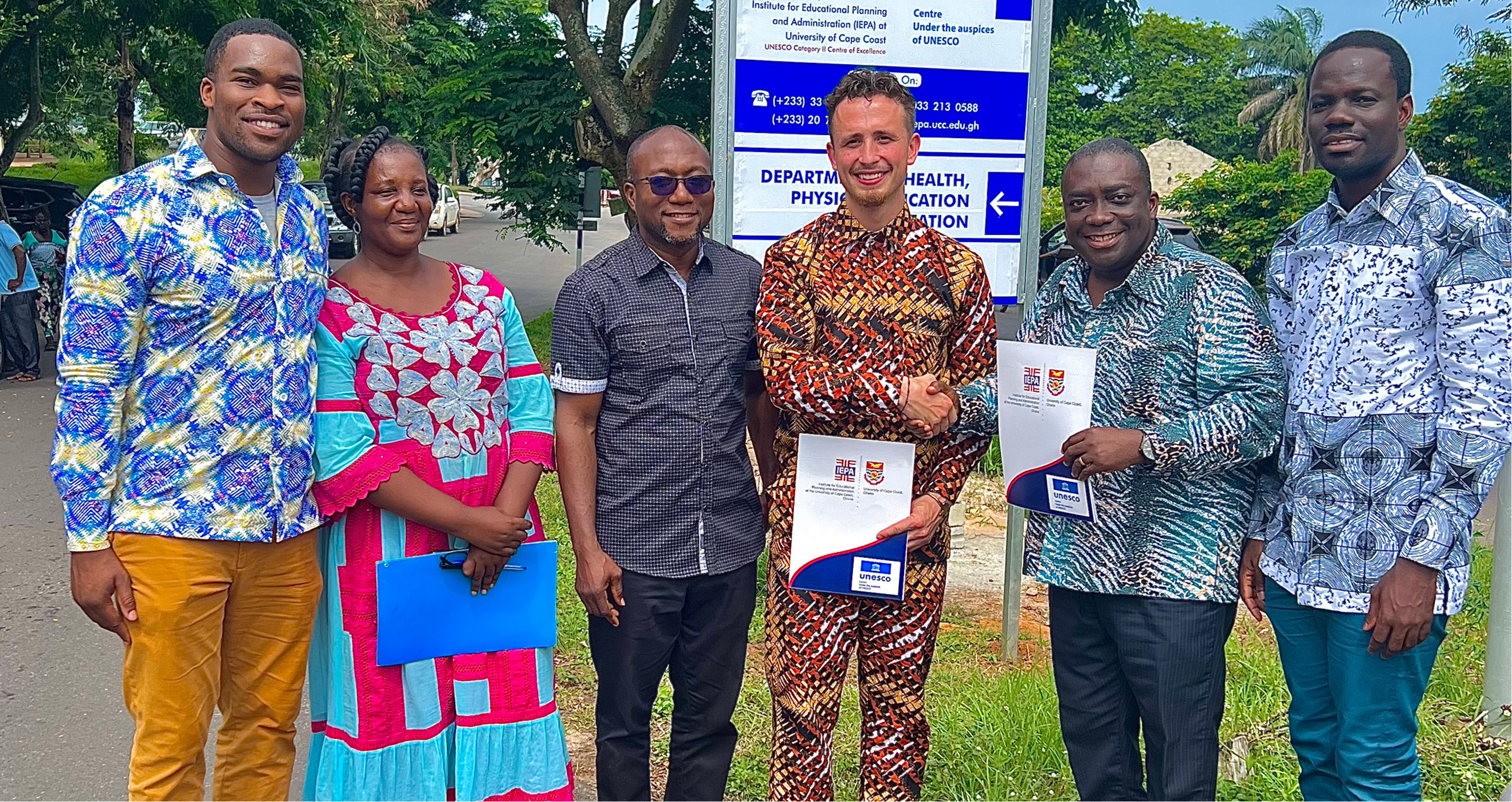 Members of True Community (including College of Education doctoral student Ebenezer Mensah, far right) and Institute for Educational Planning and Administration at the University of Cape Coast signed a memorandum of understanding to expand access to first aid and CPR skills in Ghana.