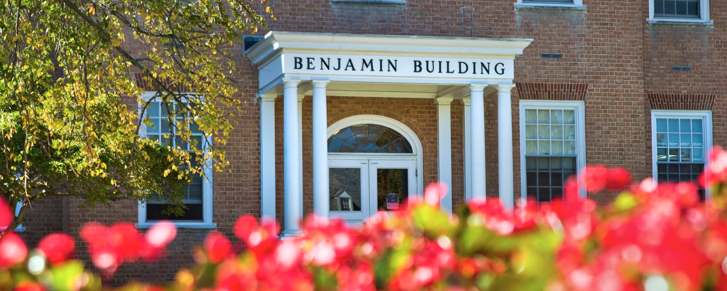 Benjamin building entrance with flowers