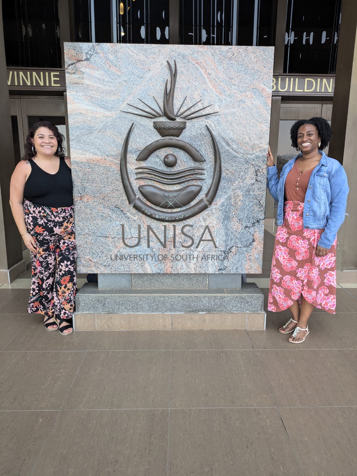 Fulbright Scholar Di-Tu Dissassa (right) in South Africa