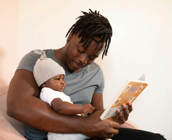 Man reading to child