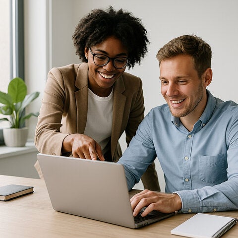 Coworkers at computer