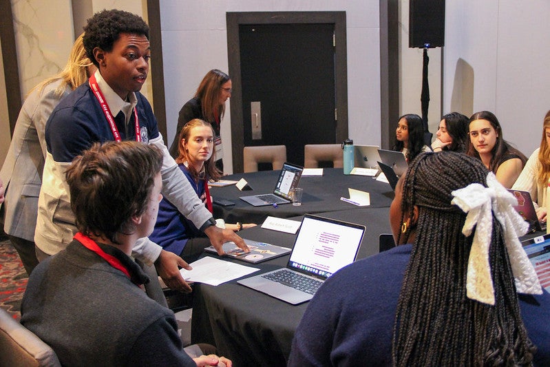 Participants engage in discussion at the Big Ten Collaboration Democracy Summit