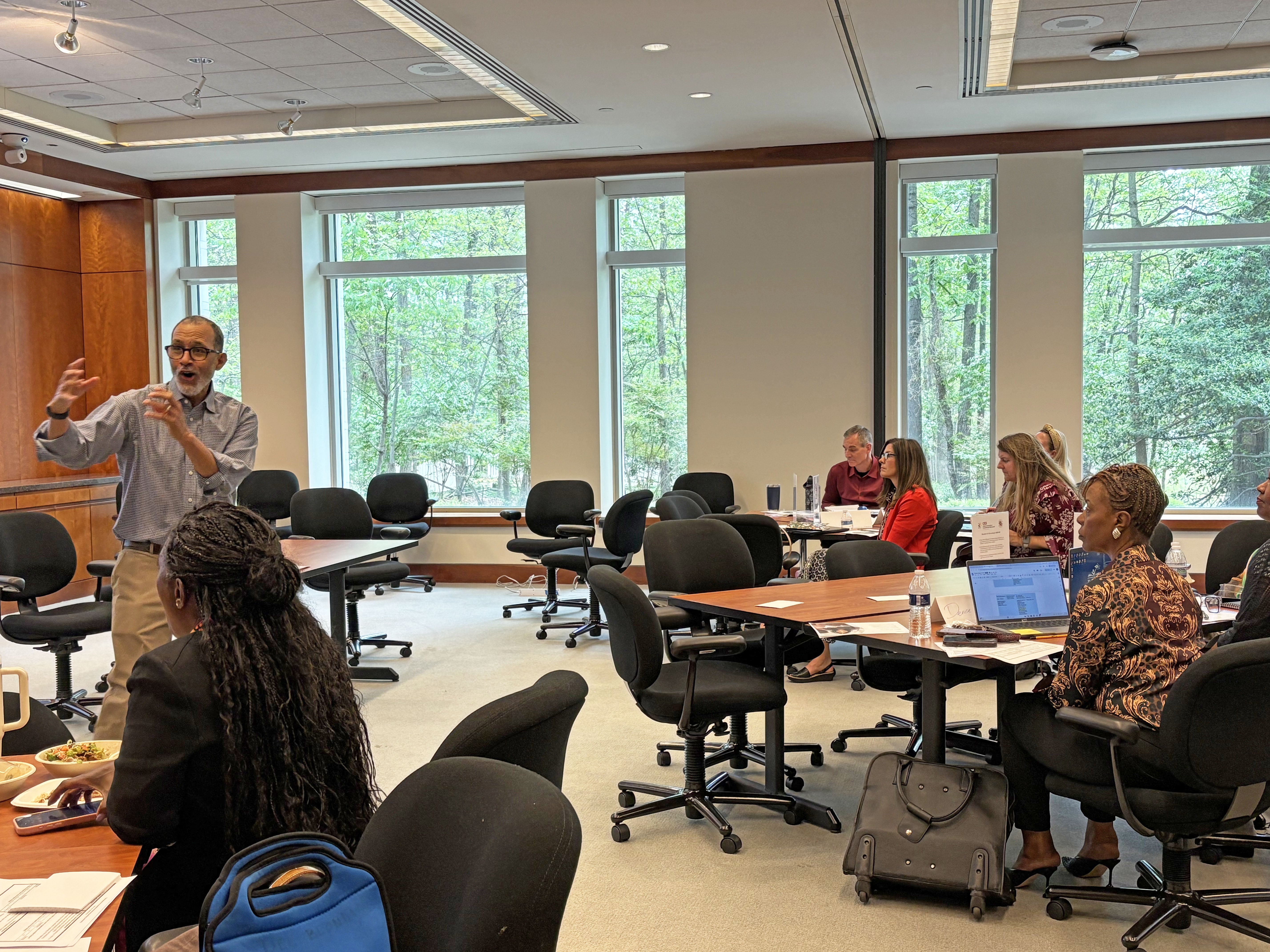 Segun Eubanks, director of the Center for Educational Innovation and Improvement, speaks to participants in the Central Office Leadership Academy.