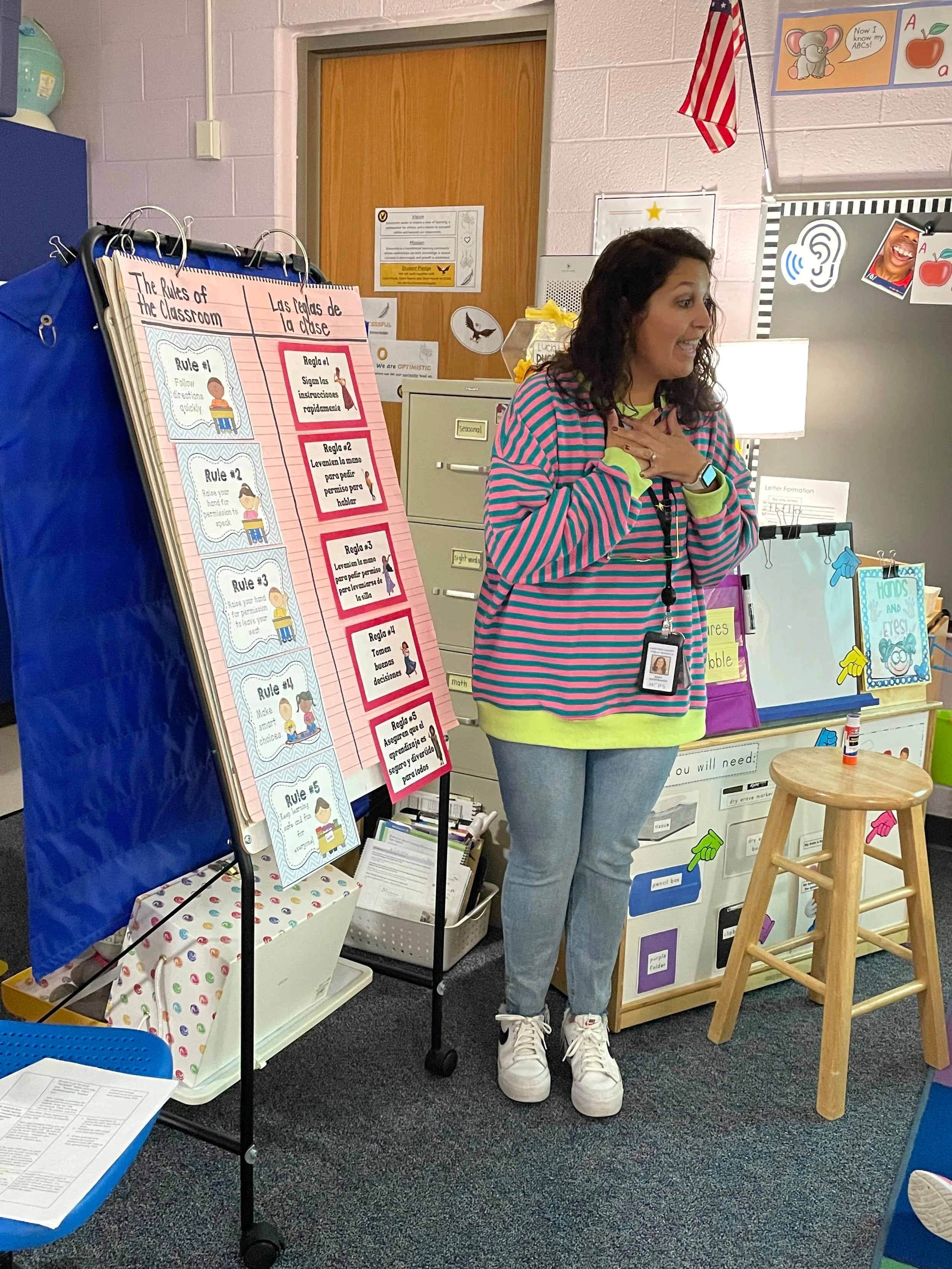 Person teaches in front of a classroom